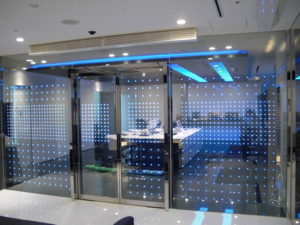 PolyMagic LED Glass in Office Space, blue LED lights, no wires. 